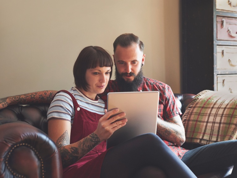 A couple using a tablet
