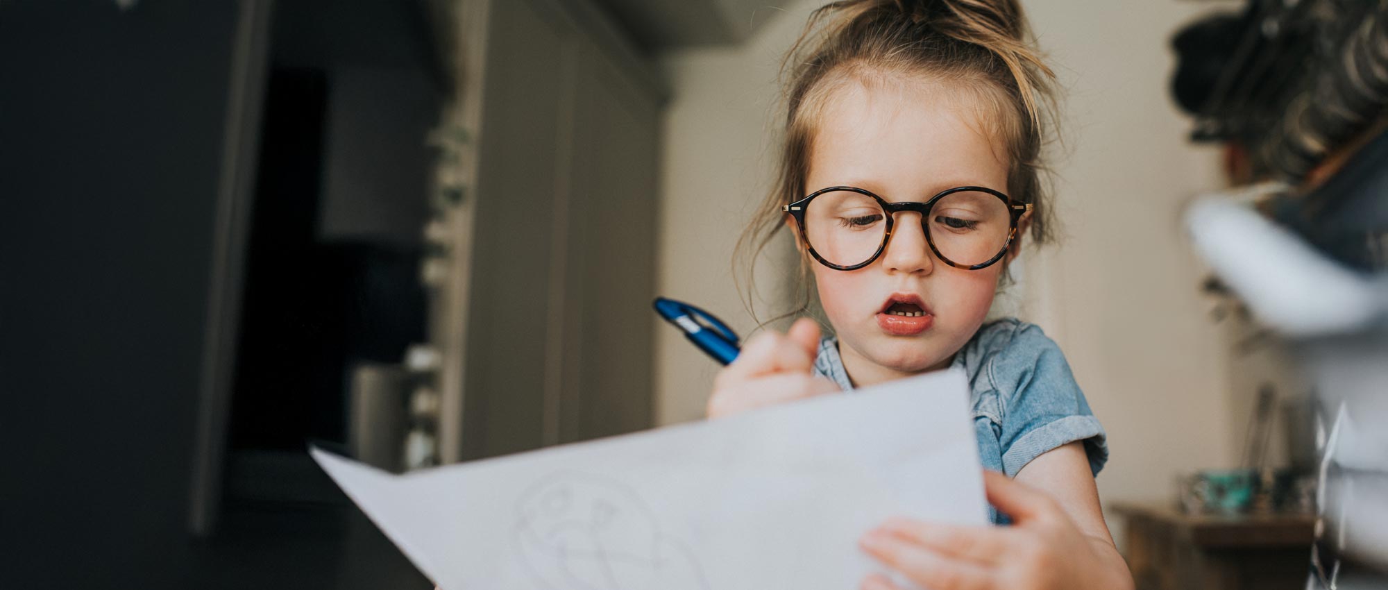 Young girl drawing.